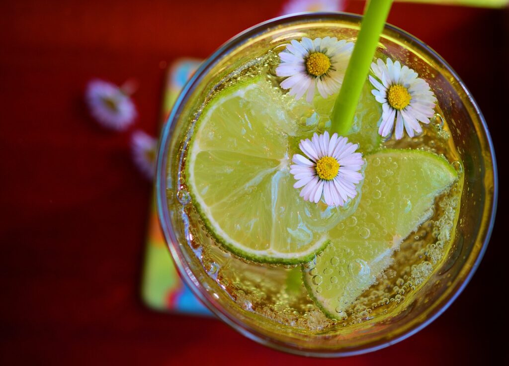 Sparkling water with limes and flowers